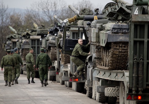 Ukrainian soldiers transport their tanks from their base in Perevalnoe, outside Simferopol, Crimea