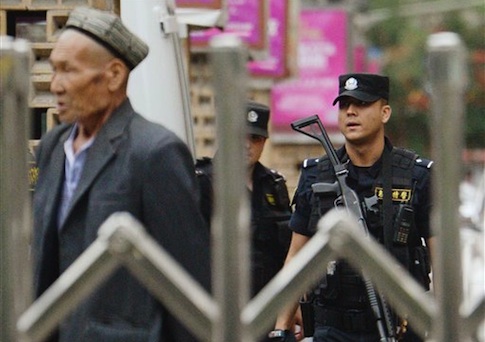 Chinese police officers keep guard in the Xinjiang Uyghur region
