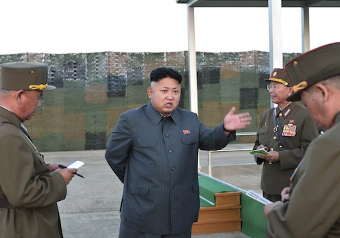North Korean leader Kim Jong Un (C) guides the actual parachuting and striking drill of paratrooper units of the KPA in this undated photo released by North Korea's Korean Central News Agency