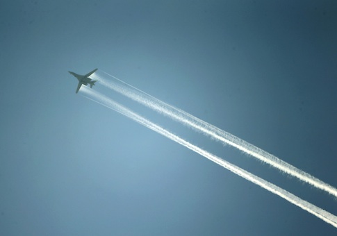A U.S.-led coalition aircraft flying over Kobani, as seen from near the Mursitpinar border crossing on the Turkish-Syrian border in the southeastern town of Suruc in Sanliurfa province October 15