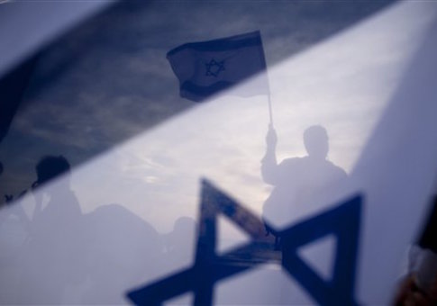 protest outside the US embassy in Tel Aviv, Israel, Sunday, May 22, 2011