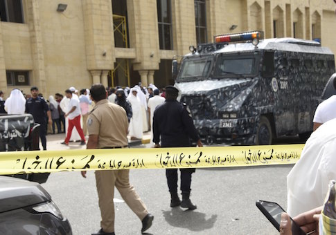 Police cordon off the Imam Sadiq Mosque after a bomb explosion following Friday prayers, in the Al Sawaber area of Kuwait City