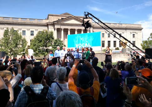 A number of speakers gather on the stage as the event ends / Stephen Gutowski