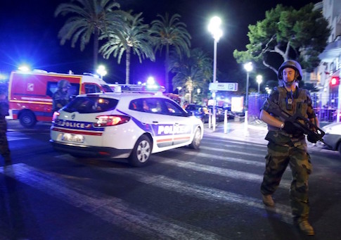 French soldiers and police secure the area after at least 30 people were killed in Nice when a truck ran into a crowd celebrating the Bastille Day national holiday