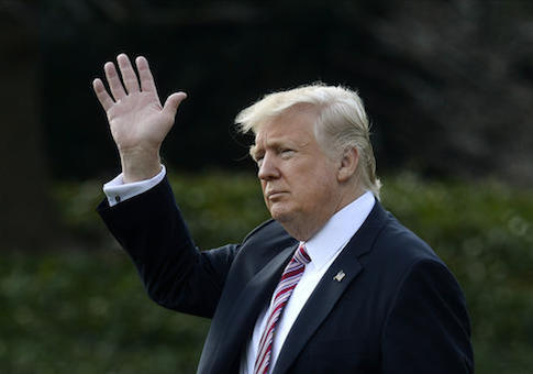 US President Donald Trump departs the White House . DC