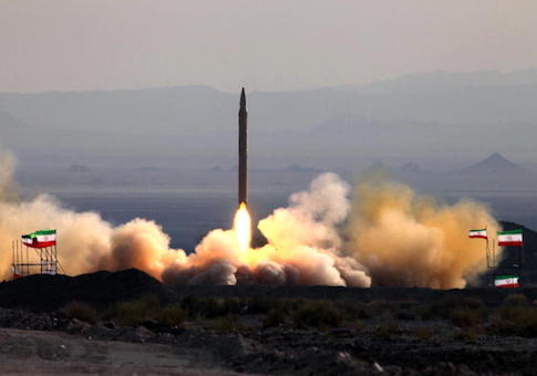 A picture taken in 2010 shows the test firing at an undisclosed location in Iran of a surface-to-surface Qiam missile / Getty Images