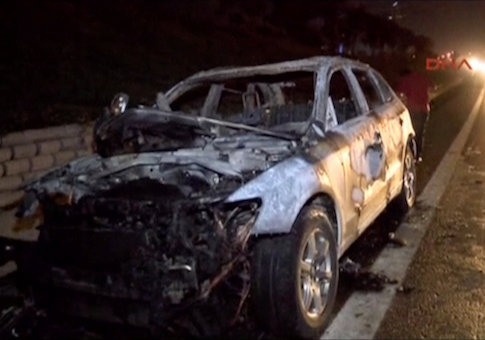 A view of a burnt jeep abandoned by the suspects after GEM TV founder Saeed Karimian was shot dead in Istanbul