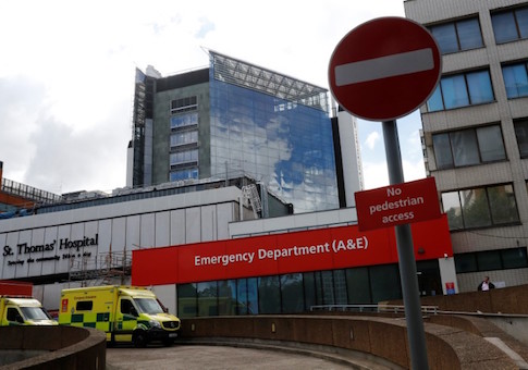 An ambulance waits outside the emergency department at St Thomas' Hospital in central London, Britain