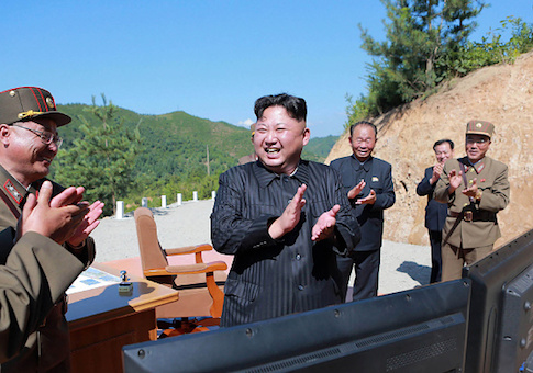 North Korean leader Kim Jong-Un celebrates the successful test-fire of the intercontinental ballistic missile Hwasong-14