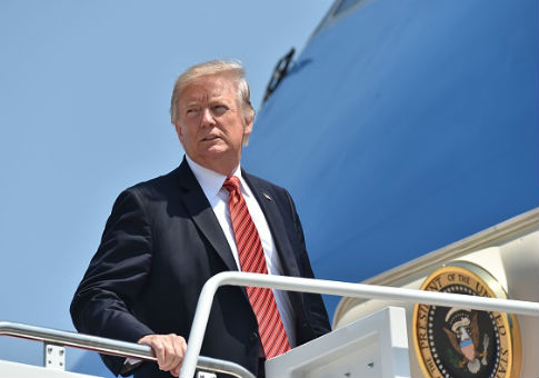President Donald Trump boards Air Force One / Getty