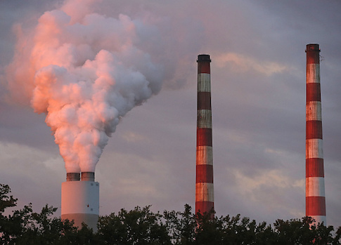 Emissions spew out of a large stack at the coal-fired Morgantown Generating Station on Oct. 10 in Newburg, Maryland / Getty Images