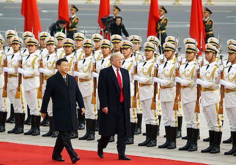 President Donald Trump takes part in a welcoming ceremony with China's President Xi Jinping