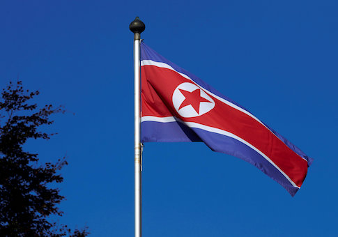 A North Korean flag flies on a mast at the Permanent Mission of North Korea in Geneva