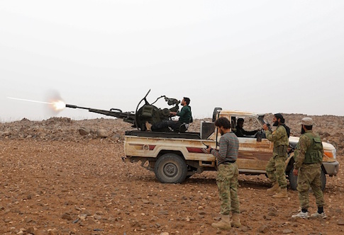 Syrian rebel fighters battle government forces