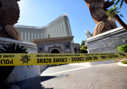 Police tape blocks an entrance at the Mandalay Bay Resort & Casino