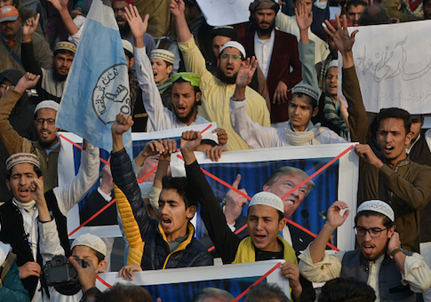Pakistani demonstrators take part in a protest against U.S. aid cuts