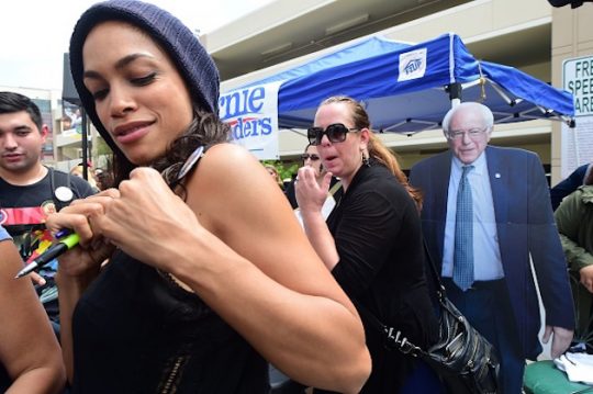 Rosario Dawson with Bernie Sanders cutout