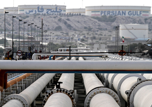 A picture shows export oil pipelines at an oil facility on the shore of the Gulf