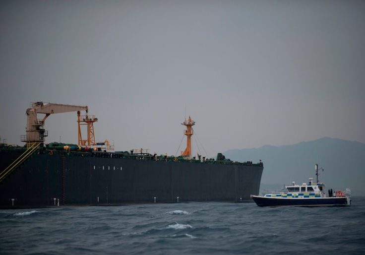 A British Police ship patrols near supertanker Grace 1 off the coast of Gibraltar