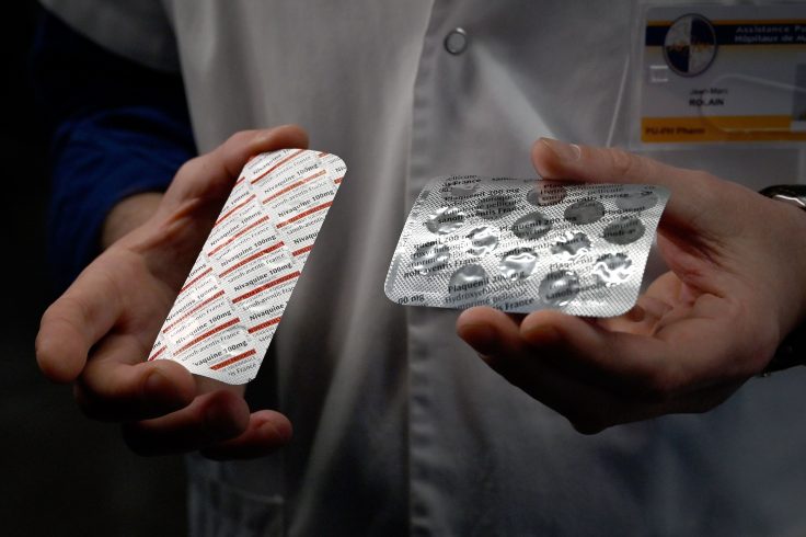 Packets of a Nivaquine, tablets containing chloroquine and Plaqueril