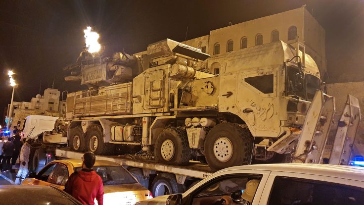 Forces loyal to Libya's UN-recognized GNA parade a Russian-made Pantsir air defense system truck
