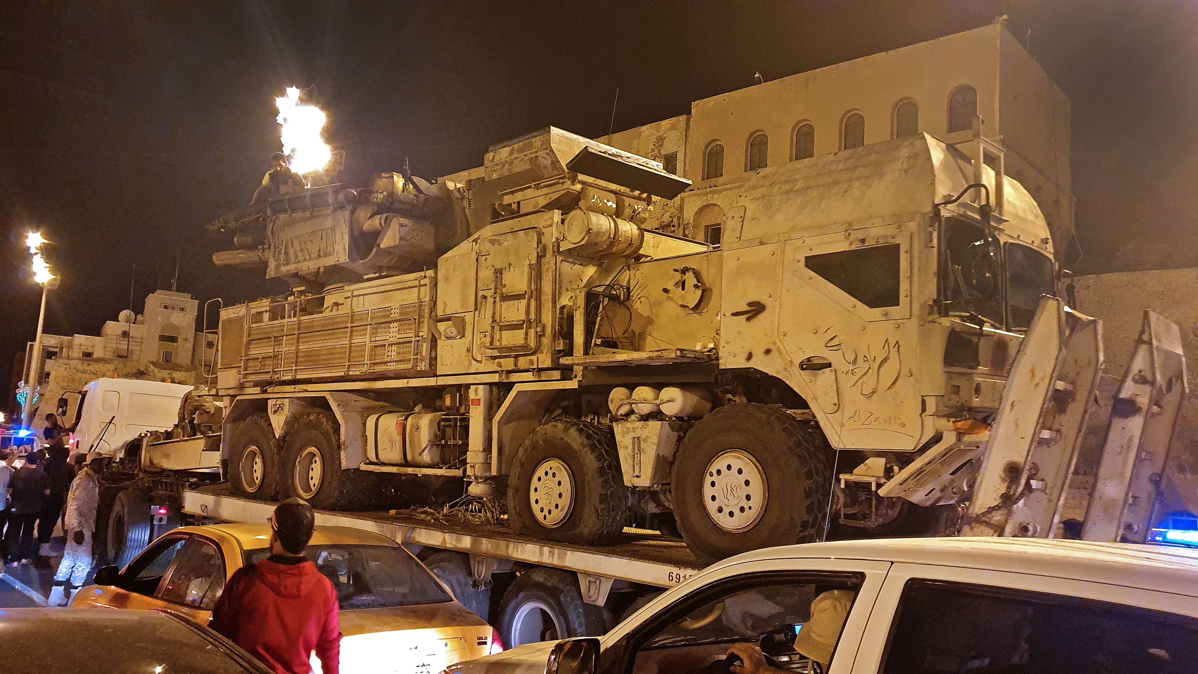 Forces loyal to Libya's UN-recognized GNA parade a Russian-made Pantsir air defense system truck
